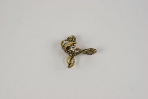 A gold snake with a white background