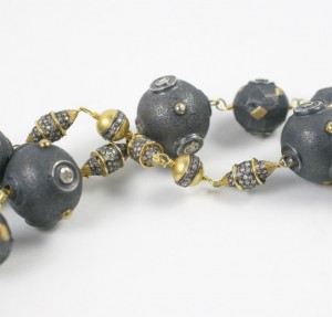 A close up of the beads on a necklace