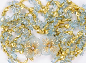A close up of some gold and blue beads