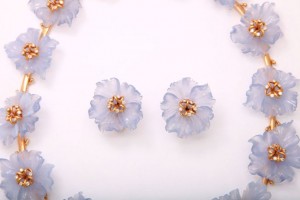 A pair of earrings made from plastic bottles
