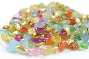 A pile of colorful beads on top of each other.