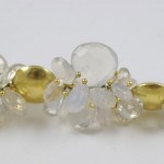 A close up of the gold and clear beads