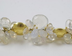 A close up of the gold and clear beads