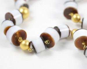 A close up of the beads on a necklace