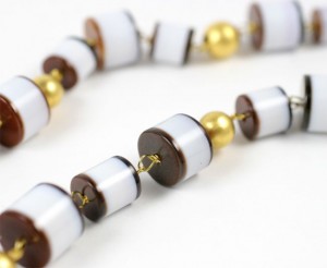 A close up of the beads on a necklace