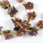 A close up of the flowers on a necklace