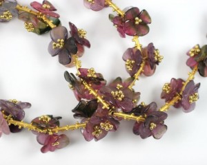 A close up of the flowers on a necklace