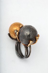 A ring with two balls on it