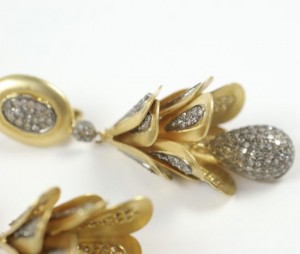 A close up of the earrings on a table