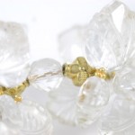 A close up of the gold and clear beads