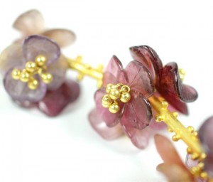 A close up of the flowers on a bracelet