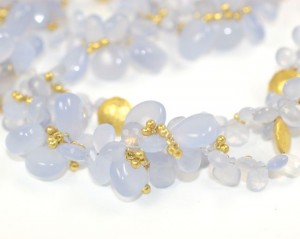 A close up of the beads on a necklace