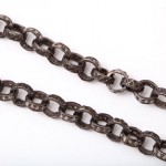 A close up of the chain link on a necklace