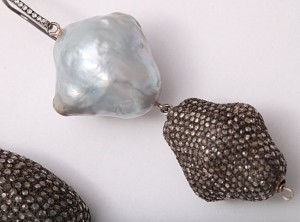 A close up of the necklace on the table