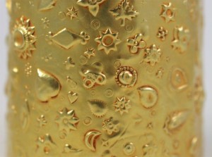 A close up of some gold colored shapes