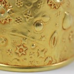 A close up of the gold plating on this object