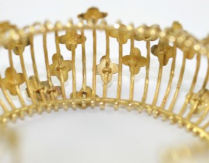 A close up of the crown on a white background