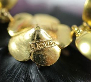 A close up of some gold colored jewelry