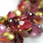 A close up of some pink and yellow beads