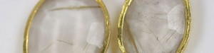 A close up of the gold color on the earrings.