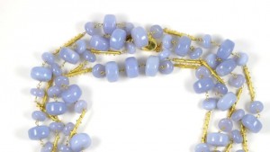 A close up of the beads on a necklace