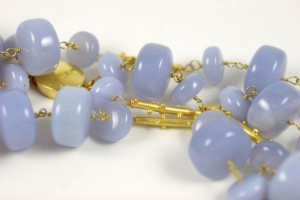 A close up of the beads on a necklace