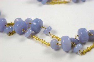 A close up of the beads on a necklace