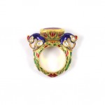 A colorful ring with two elephants on it.