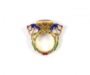 A colorful ring with two elephants on it.