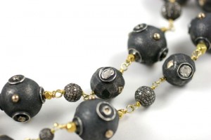 A close up of the beads on a necklace