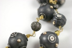 A close up of the beads on a necklace