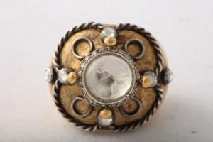 A ring with a clock on it