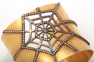 A close up of the spider web on the side of a bowl