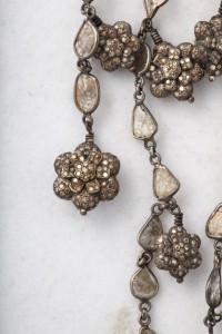 A close up of the necklace on display.