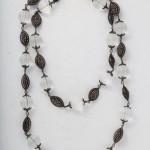 A long necklace with black and white beads