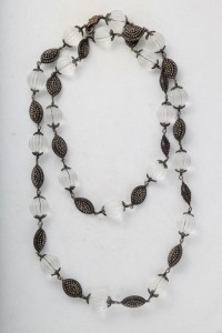 A long necklace with black and white beads