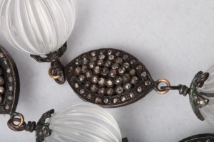 A close up of the beads on a necklace