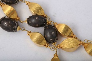 A close up of the necklace on a table