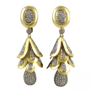 A pair of diamond and gold earrings.