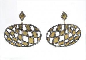 A pair of earrings with diamonds and gold.