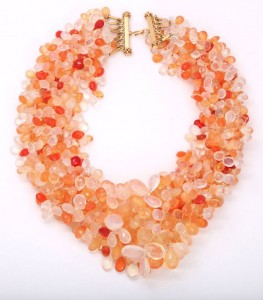 A necklace of orange beads is shown.