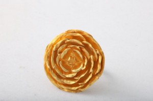A close up of a candle on top of a table