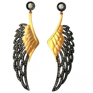 A pair of earrings with wings and black diamonds.