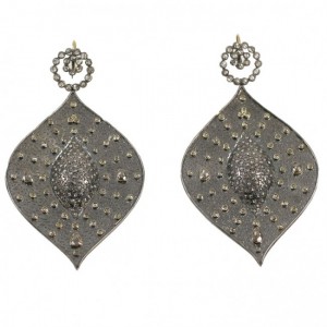 A pair of earrings with a diamond and silver leaf design.
