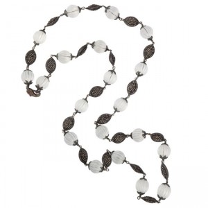 A long necklace with black and white beads