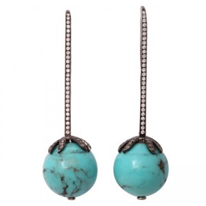 A pair of turquoise and diamond earrings.