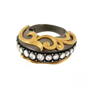 A gold and silver ring with diamonds on it.