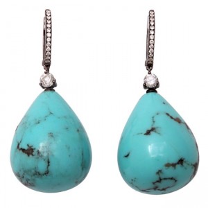 A pair of turquoise and diamond earrings.