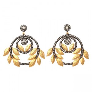 A pair of gold and diamond earrings.