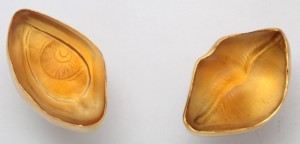Two pictures of a peanut shell on the left and right side.